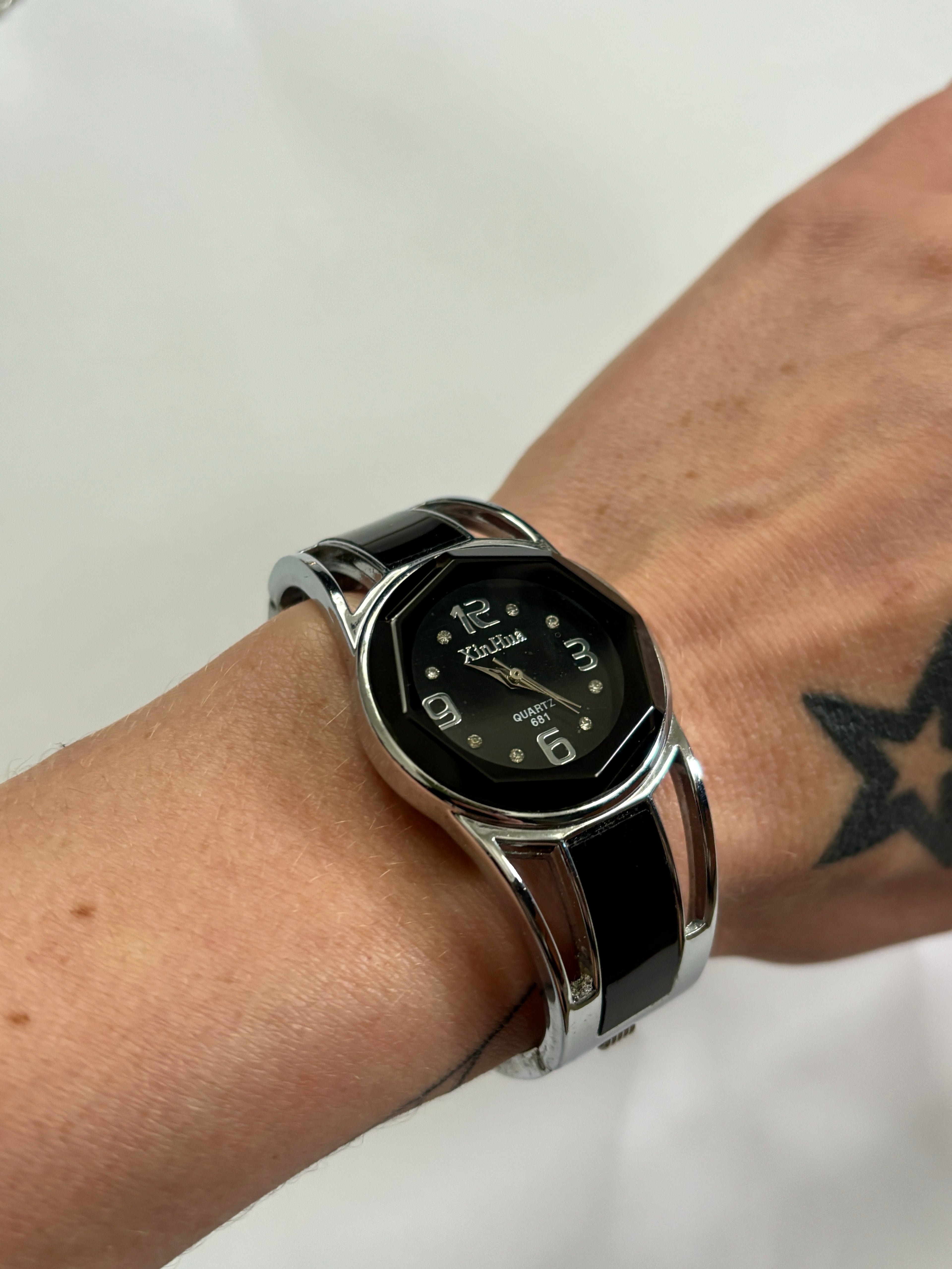 Black and Silver Bangle Watch
