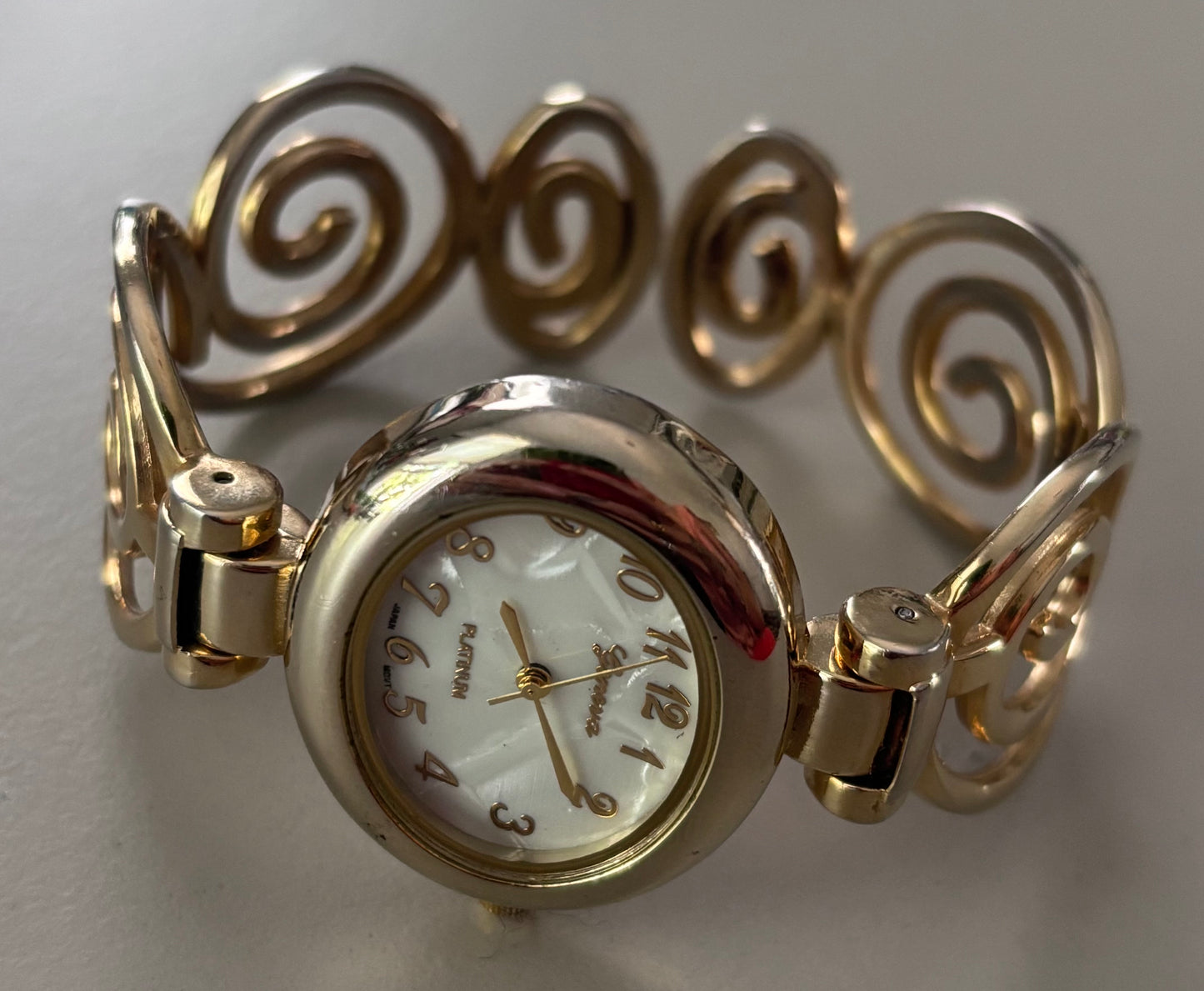 Gold Spiral Watch