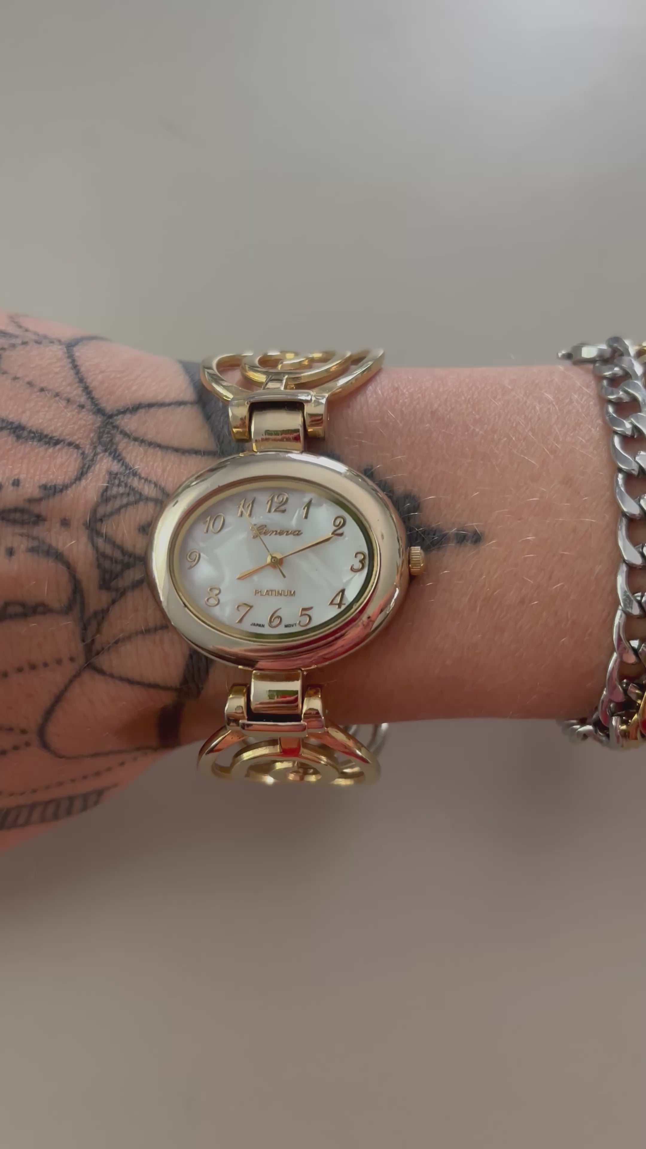 Gold Spiral Watch